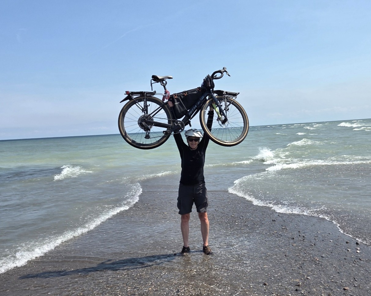 woman holding a bike